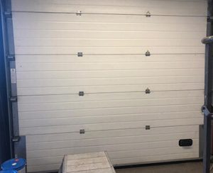 white roller shutter before