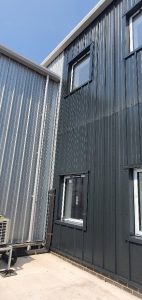 Cladding after spraying