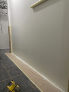 during white panel wall repairs