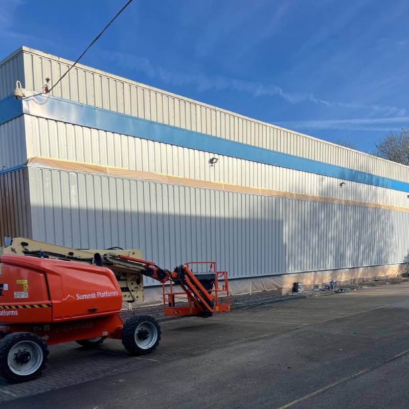 Building after cladding spraying