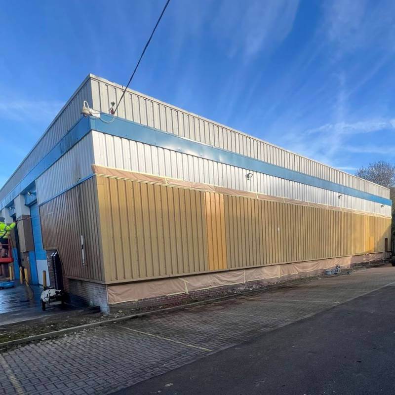 Building before cladding spraying