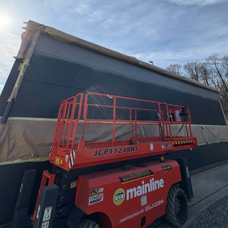 Cladding before spraying