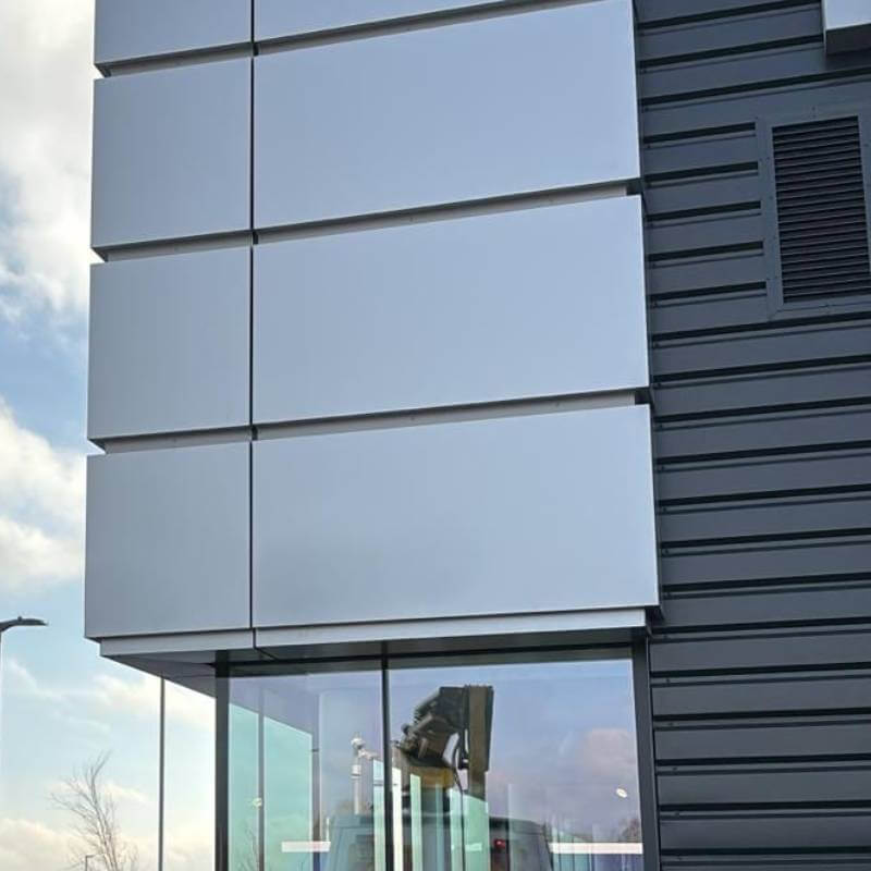 Building after cladding spraying